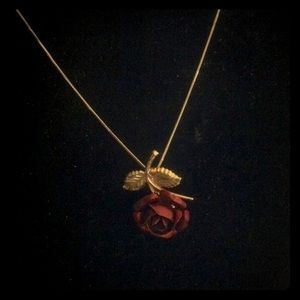 Beautiful Rose that suspends from a chain